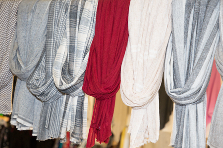 shop market in street with display for scarfsの写真素材