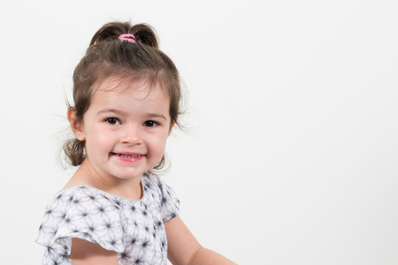 Portrait of cute emotional beautiful little girl Isolated on white backgroundの写真素材