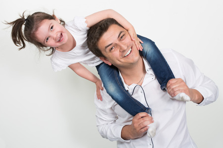 family modern single father play fun with daughter child girlの写真素材