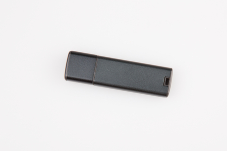 Blank mockup for design black USB memory stick isolated on white