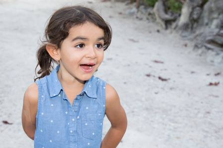 fun child girl outdoor in home garden alleyの写真素材