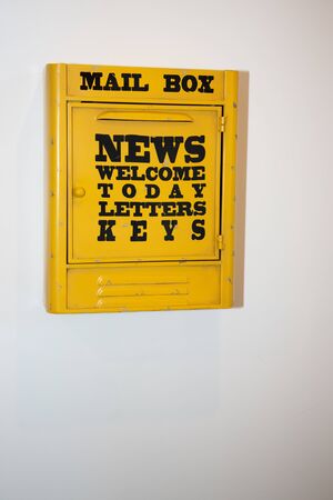 Yellow post box mailbox for mail letter