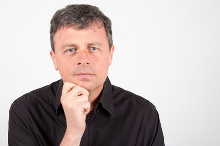 Middle-aged confident man wearing casual clothes black shirt