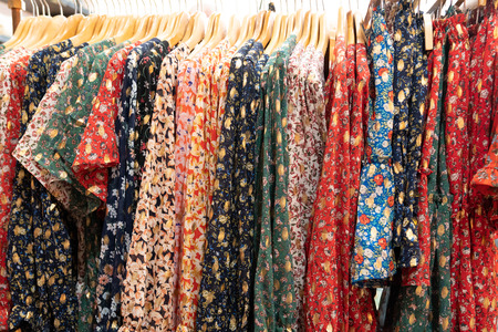 woman clothing on hanger at the modern shop boutique for background