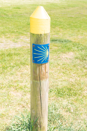 Camino de Santiago Compostela sign shells and trail marks, one of the most popular routes for...