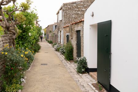 authentic cobblestone street in Saint Martin de Re Franceの写真素材