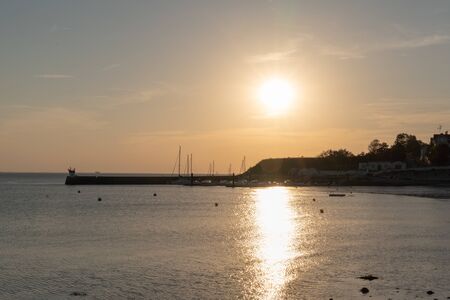 Sunset over the sea in Fourasの写真素材