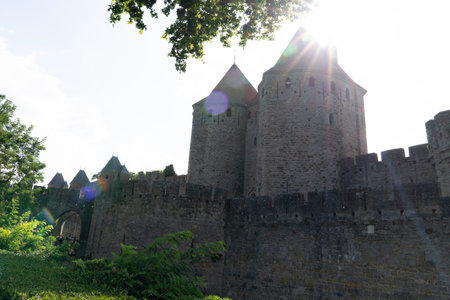 Wall and tower of Carcassonne in sun light in Aude Franceのeditorial素材