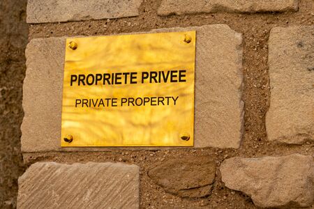Engraved Private Property Metall Door Plate write in english and Frenchの写真素材