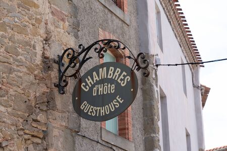 Chambre d'hotes means guesthouse in sign street road on buildingの写真素材