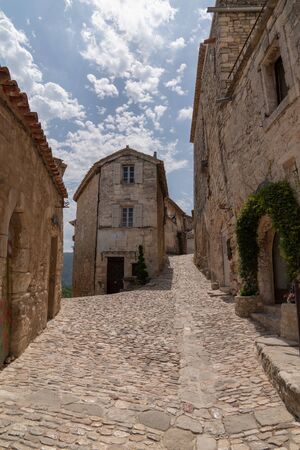 medieval center street of Lacoste in Provence in south Franceの写真素材
