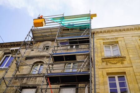 Reconstruction with scaffolding old building in Bordeaux Franceの写真素材