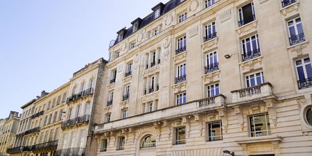 Bordeaux like Paris Haussmann buildings in chic area street city center in web banner template headerの写真素材