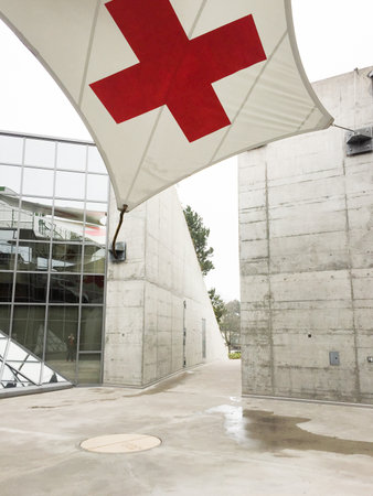 Genova , SWISS / Switzerland - 06 02 2019 : red cross flag in uno swiss united nationsのeditorial素材