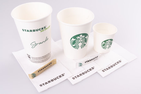 Bordeaux, Aquitaine / France - 03 09 2019 : Composition with sugar paper towel and cardboard glass Starbucks coffeeのeditorial素材