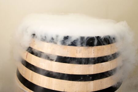 cellar smoke dry ice in harvest wood barrel for refresh grapes fermentation