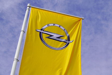 Arcachon , Aquitaine / France - 10 08 2019 : Opel dealership flag logo sign against blue sky Peugeot groupのeditorial素材