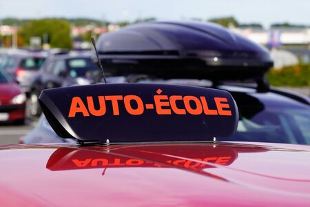 french driving school city car roof signの写真素材