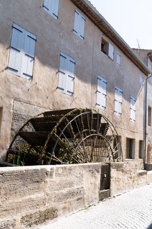 Isle-sur-la-Sorgue Water wheel on city canal isle sur la sorgue Vaucluse provence Franceの写真素材