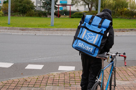 Bordeaux , Aquitaine / France - 11 19 2019 : stuart delivery bike man on cycle bikeのeditorial素材