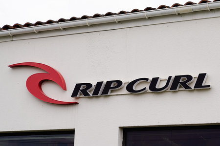 Bordeaux , Aquitaine / France - 11 18 2019 : Rip curl logo surf skate clothes boardshort sign...
