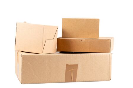 piles of brown used cardboard boxes on a white background