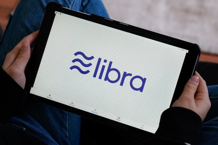Bordeaux , Aquitaine / France - 11 25 2019 : Libra sign logo coin currency Online Crypto virtual electronic money on computer tabletのeditorial素材