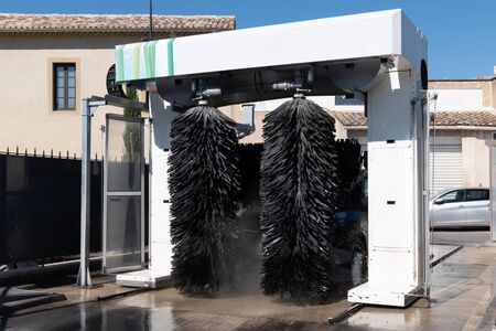 car during washing in automatic machineryの写真素材