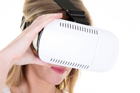 woman in goggles mask experiencing virtual reality vr as new entertainment device