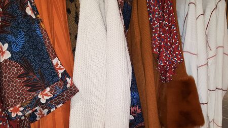 Fashionable clothes in a boutique store background clothing