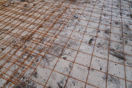 home floor construction site process of hollow core slabs made of concrete with crushed stone and an iron cable raw materialsの写真素材