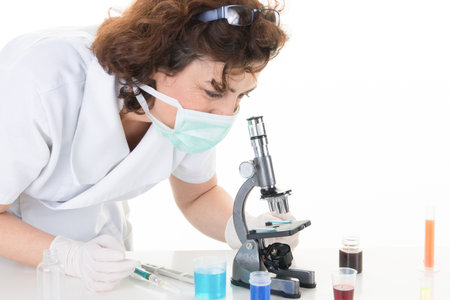 Novel coronavirus COVID-19 woman chemist working in a laboratoryのeditorial素材