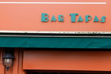 vintage tapas bar sign wall restaurant on streetの写真素材