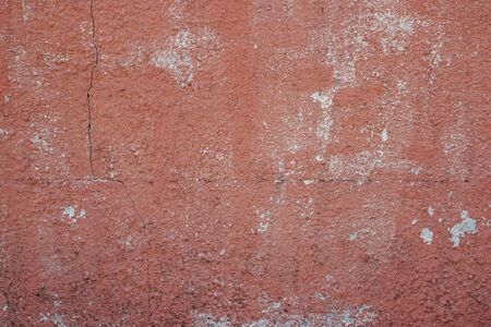 old ancient red pink stucco rustic wall texture cement backgroundの写真素材