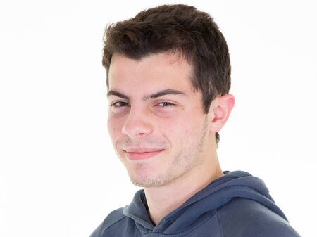 happy handsome sporty young man smiling over white background