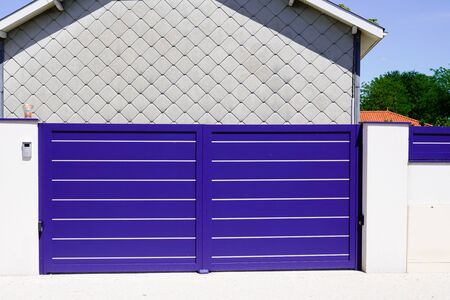 Blue classic portal modern house gate door to access garage home gardenの写真素材