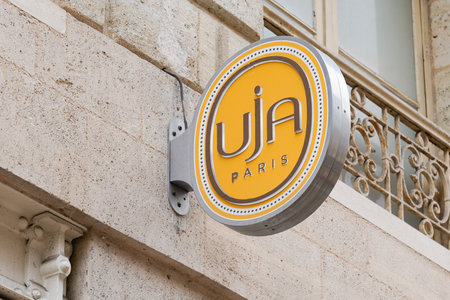 Bordeaux , Aquitaine / France - 05 10 2020 : uja paris un jour ailleurs shop yellow logo sign women fashion store brandのeditorial素材