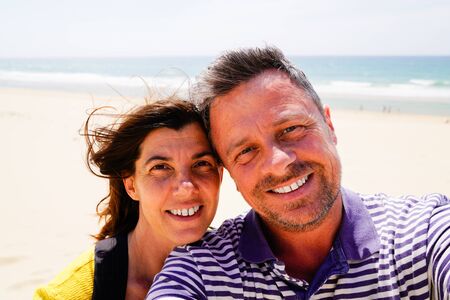 couple woman and man handsome boyfriend happy family taking selfie self portrait smartphone camera...