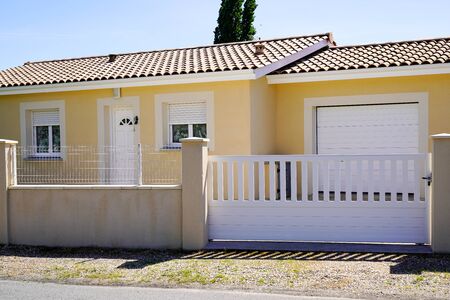 modern white suburb metal aluminum house gate in street homeの写真素材