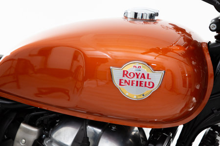 Bordeaux , Aquitaine / France - 06 01 2020 : royal Enfield motorcycle orange fuel tank with logo...