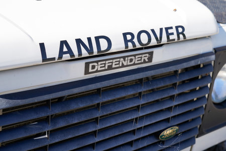 Bordeaux , Aquitaine / France - 06 14 2020 : Land Rover Defender logo car sign front of iconic British off road vehicle brandのeditorial素材