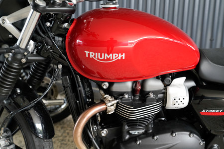 Bordeaux, Aquitaine / France - 07 17 2020: triumph motorcycle detail sign logo on red fuel tank on...