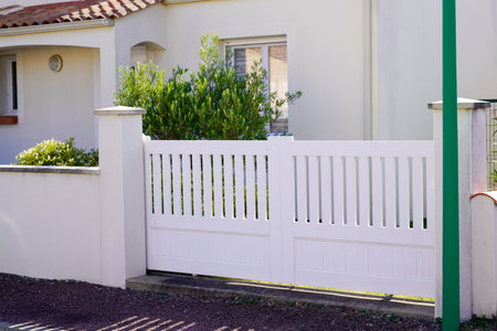 suburb portal home white pvc plastic house gate slatsのeditorial素材