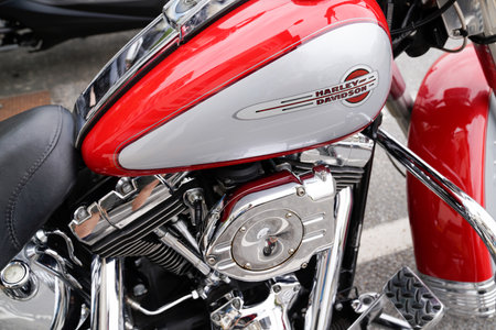 Bordeaux, Aquitaine / France - 07 28 2020: harley davidson logo on gray red tank of american custom...