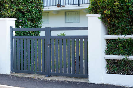 Aluminum gray house door modern gray portal of suburb homeの写真素材