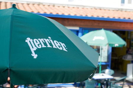 Bordeaux, Aquitaine / France - 08 04 2020: Perrier logo sign and text on bar sell sparkling Natural Mineral Waterのeditorial素材