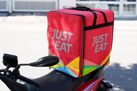 Bordeaux, Aquitaine / France - 08 04 2020: Just Eat logo and text sign on delivery scooter vehicle motorbikeのeditorial素材