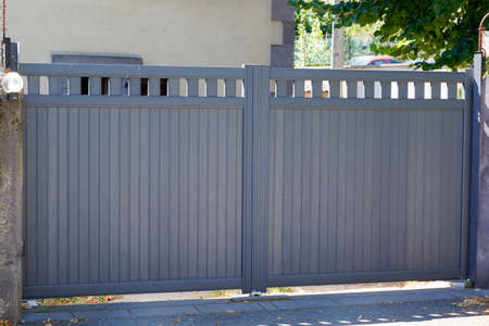 steel gray street gate aluminum portal of suburb home