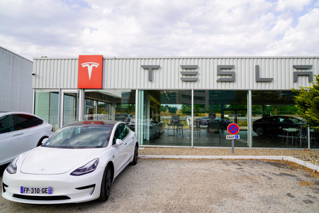 Bordeaux, Aquitaine / France - 08 15 2020: Tesla logo and text sign on store car with model S and 3 outsideのeditorial素材