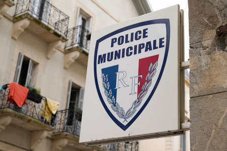 municipal police logo and text sign on building official officeの写真素材